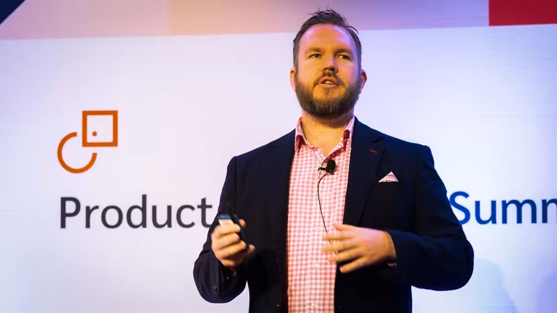 Andrew Hatfield speaking at Product Summit